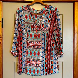 Ariat multi color quarter sleeve top.